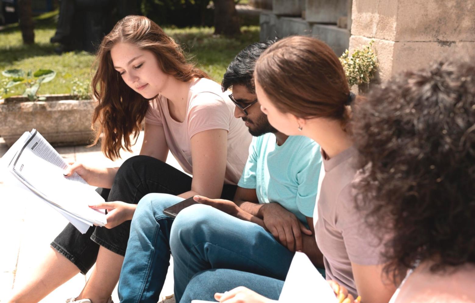 Financial analysts reviewing statements and data visualizations during a training session